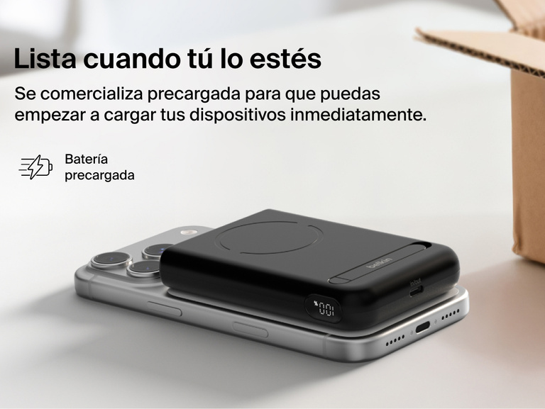 Belkin UltraCharge Pro Power Bank 10K with magnetic ring shown attached to a smartphone, highlighting a precharged battery and ready-to-use portable wireless charging straight out of the box.